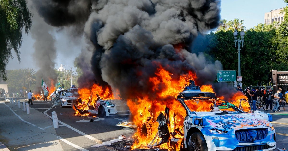WayMo suspended car service in downtown los angeles after 5 vehicles set sublaze during ice protests