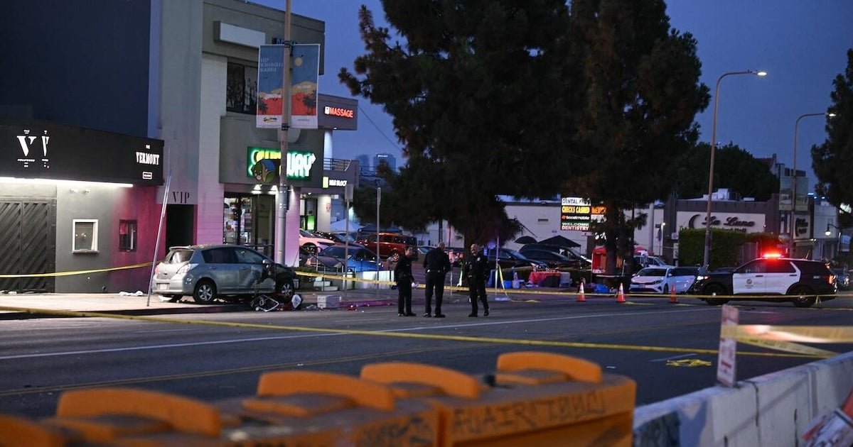The driver is running on the line of people in the police say he was shot